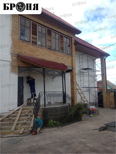 Thermal insulation Bronya and Gydrophobizator Bronya on the facade of a cottage in Khanty-Mansiysk (photo)