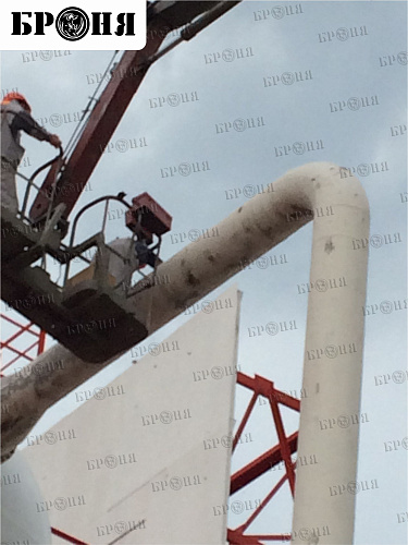 Thermal insulation Bronya Winter when isolating oil storages, equipment and pipelines of the Variogan field, Lukoil, Tyumen Region (photo)