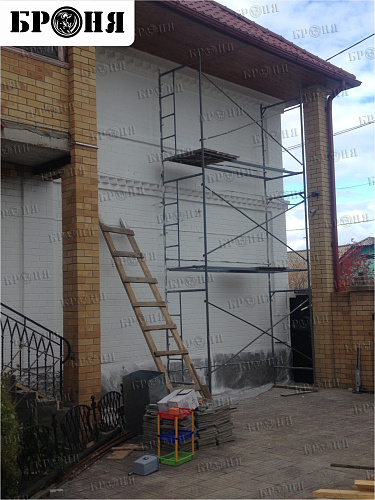 Thermal insulation Bronya and Gydrophobizator Bronya on the facade of a cottage in Khanty-Mansiysk (photo)