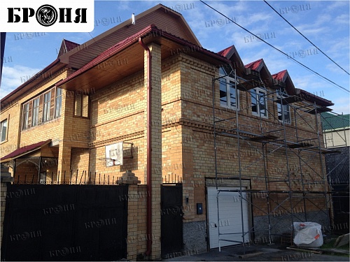Thermal insulation Bronya and Gydrophobizator Bronya on the facade of a cottage in Khanty-Mansiysk (photo)
