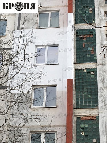 Warming of the walls of a multi-storey building in Volgograd (photo)