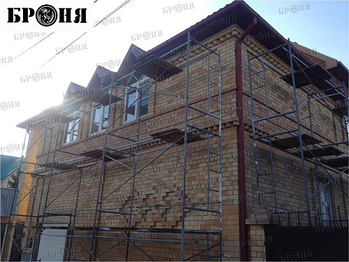 Thermal insulation Bronya and Gydrophobizator Bronya on the facade of a cottage in Khanty-Mansiysk (photo)
