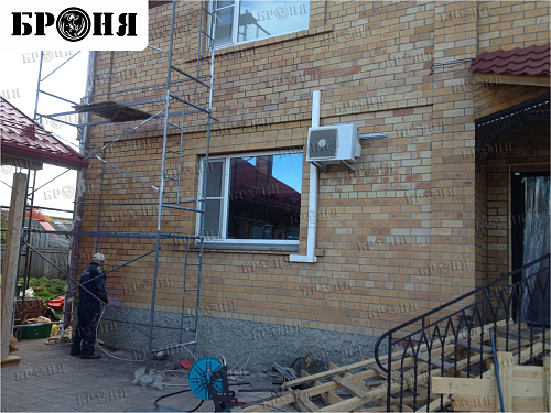 Thermal insulation Bronya and Gydrophobizator Bronya on the facade of a cottage in Khanty-Mansiysk (photo)