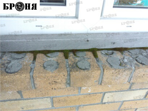 Thermal insulation Bronya and Gydrophobizator Bronya on the facade of a cottage in Khanty-Mansiysk (photo)