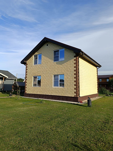 Application Bronya Facade for thermal insulation of a country cottage, with tinting, Leningrad region (photo)