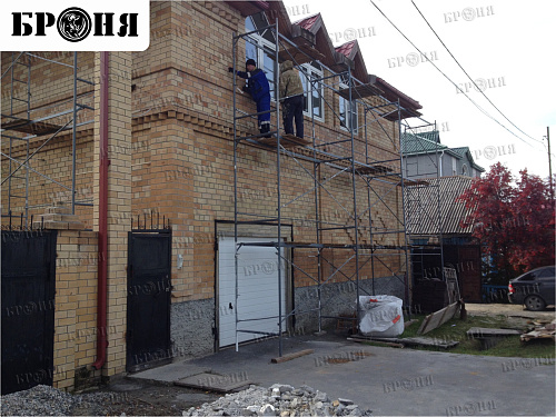 Thermal insulation Bronya and Gydrophobizator Bronya on the facade of a cottage in Khanty-Mansiysk (photo)