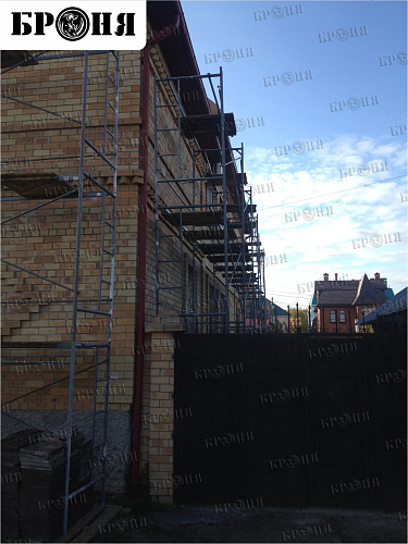 Thermal insulation Bronya and Gydrophobizator Bronya on the facade of a cottage in Khanty-Mansiysk (photo)