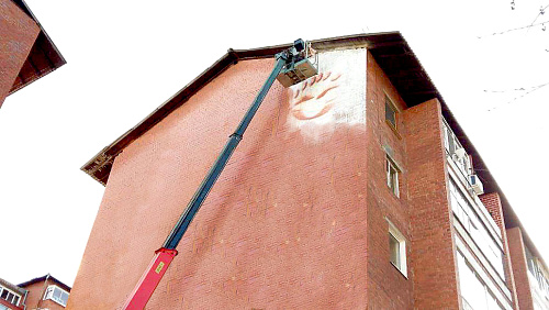 Thermal insulation Bronya Facade for insulation of multi-storey residential house, Irkutsk (photo)