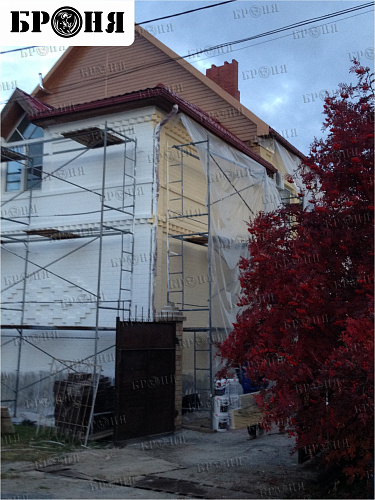 Thermal insulation Bronya and Gydrophobizator Bronya on the facade of a cottage in Khanty-Mansiysk (photo)