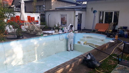 Bronya Facade and Bronya Aquablock for thermal insulation of a private house and waterproofing of a decorative pond in Cologne, Germany