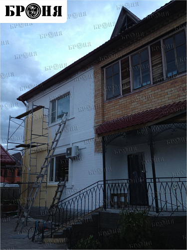Thermal insulation Bronya and Gydrophobizator Bronya on the facade of a cottage in Khanty-Mansiysk (photo)